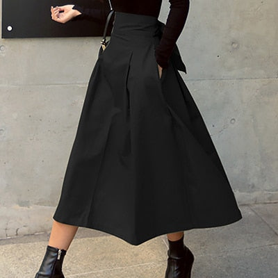 Chantel Women's High Waist Midi Skirt | Pleated A-Line Bow Detail | Smart Casual Statement Skirt